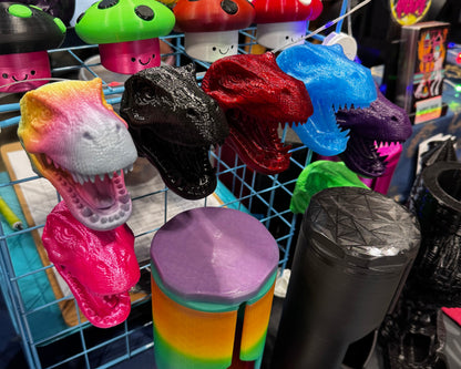 Variety of t-rex magnets on wire grid